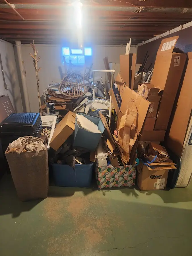 Roll-off dumpster container at job site for Cleanout Dumpster Rental in Quincy